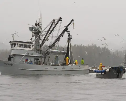 US Coast Guard is searching for 5 people after a fishing boat reportedly capsized in seas off Alaska