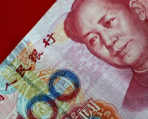 China's yuan slides to 4-month low on tariff threats and mixed PMI data