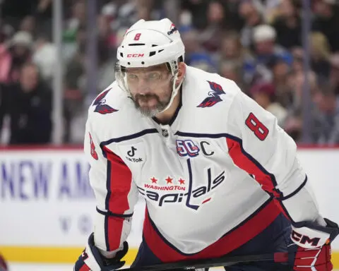 Alex Ovechkin skates before Capitals practice as he works to return from a broken leg