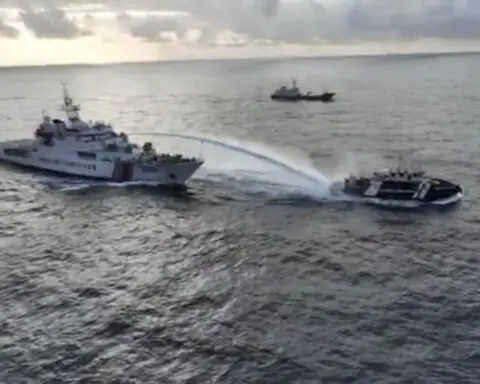 Philippines says China's coast guard fired water cannons and sideswiped its patrol vessel