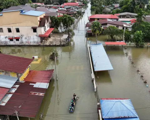 Malaysia health volunteers on alert for waterborne disease after devastating floods