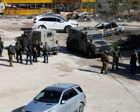 Israeli settlers attack two Palestinian towns and their own military in West Bank