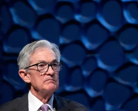 Powell says a strong US economy is letting the Fed be ‘cautious’ about cutting interest rates