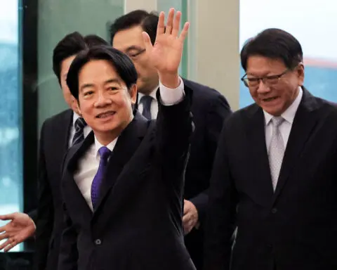 Taiwan president, in Guam, says: We won't bow to totalitarianism