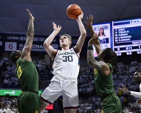 McNeeley scores 17 points as No. 25 UConn rallies to a 76-72 win over No. 15 Baylor