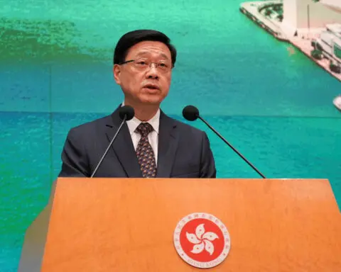 Hong Kong leader sacks two senior officials in aim to 'do better'