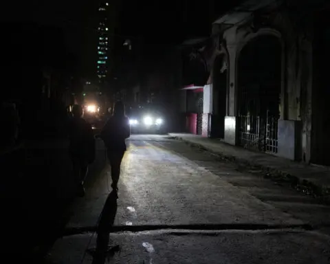 Cuba electrical grid back online but many still without power