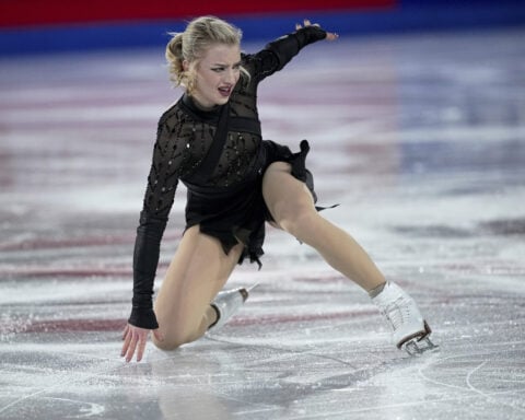 Amber Glenn takes the lead in Grand Prix Final figure skating after Kaori Sakamoto falls