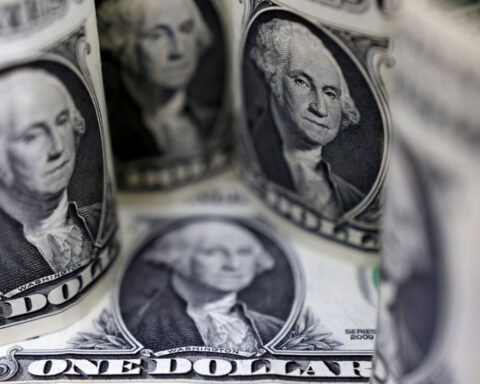 US dollar advances, fades earlier sell-off ahead of next week's inflation