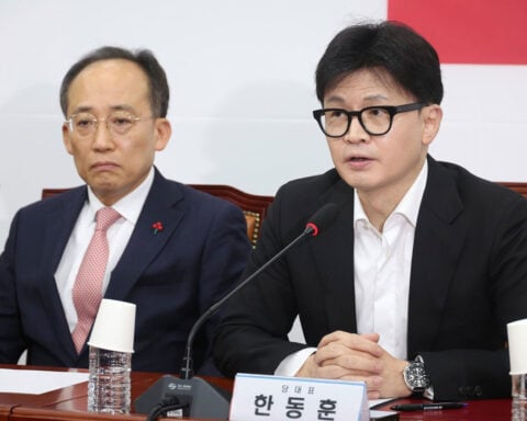 South Korea’s ruling party leader calls for suspension of president’s powers in dramatic reversal