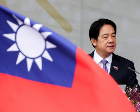 Ahead of expected war games, Taiwan urges China to 'unclench its fists'