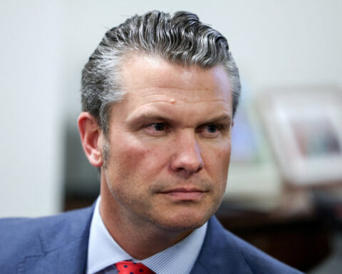Trump stands by Pentagon pick Hegseth as nomination in doubt