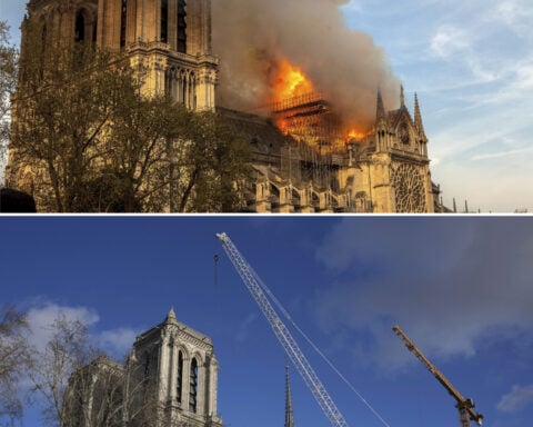 The Latest: The famed Notre Dame Cathedral in Paris reopens to great fanfare