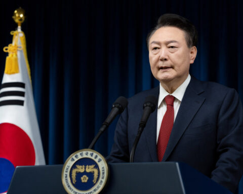 South Korea's Yoon: Embittered survivor staggers on after impeachment vote