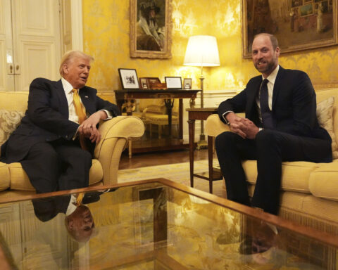 Trump is welcomed by Macron to Paris with presidential pomp and joined by Zelenskyy for their talks