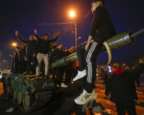 Syria latest: Syrians celebrate Bashar Assad's fall as his whereabouts remain unknown