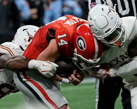 Georgia’s quarterbacks – one injured, the other untested – come up huge to lead the Bulldogs to another SEC championship