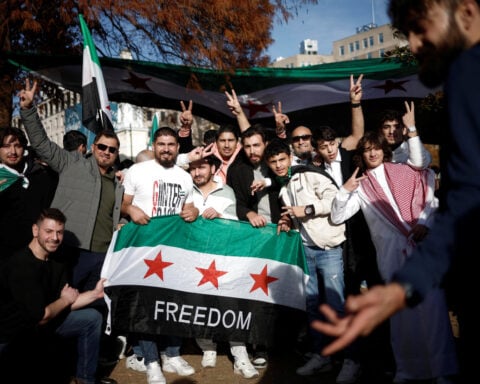 US to work with partners in Syria to manage risk after Assad toppled, Biden says