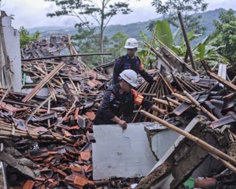 Landslides and flash floods hit Indonesia’s Java island, leaving 10 dead and 2 missing