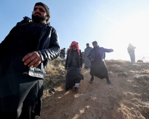 Despairing Syrians search notorious Sednaya prison for missing relatives