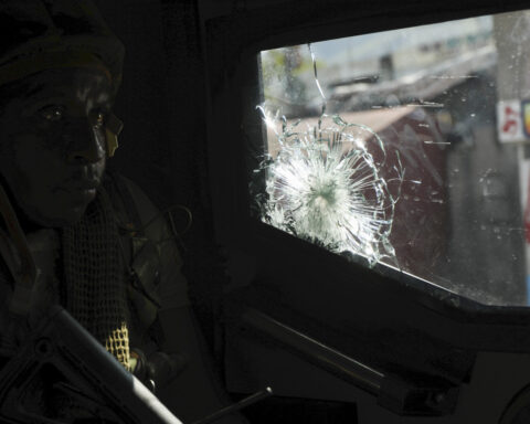 A gang leader in Haiti is accused of massacring older people to avenge his son's death