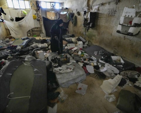 Syrian rebels free prisoners from Assad's notorious dungeons who celebrate in Damascus streets