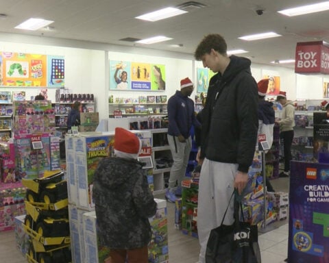 'It's really wholesome': Marquette student-athletes spread holiday cheer with kids shopping spree