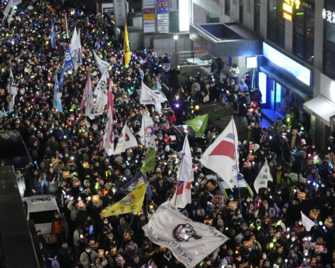 South Korea's Justice Ministry imposes a travel ban on President Yoon over martial law