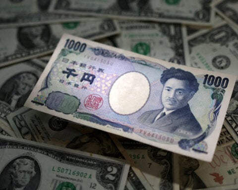 Dollar higher after CPI; China considers letting yuan weaken