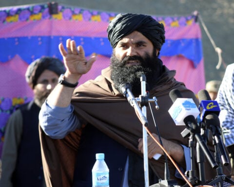Thousands attend the funeral of a Taliban minister killed by an Islamic State suicide bomber