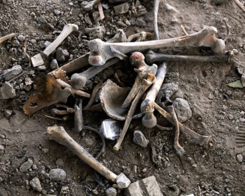 At site of suspected mass killings, Syrians recall horrors, hope for answers