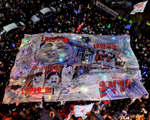 South Korea opposition leader urges president's party to back impeachment over martial law