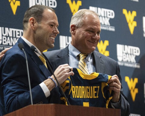 New West Virginia coach Rich Rodriguez says leaving for Michigan 17 years ago was a 'mistake'