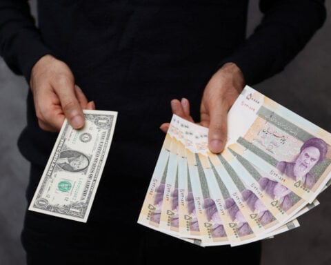 Iran currency slips to new lows amid U.S., Europe tensions