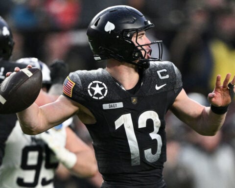 A gutsy fake punt to an unlikely hero seals Navy’s upset win over Army in the rivalry’s 125th game