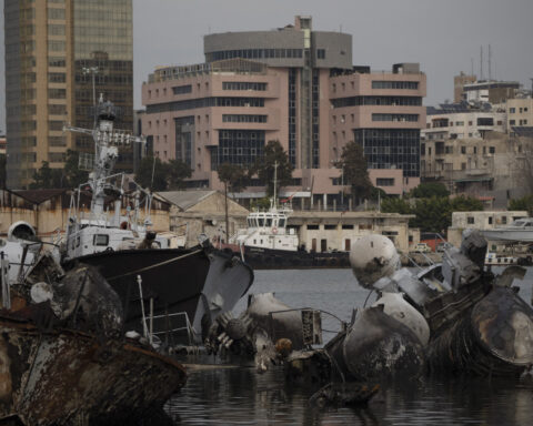 Middle East latest: Assad says he wanted to stay in Syria but Russia evacuated him