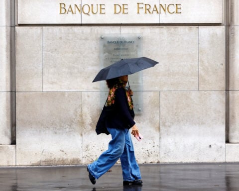 French central bank trims growth outlook on political drama