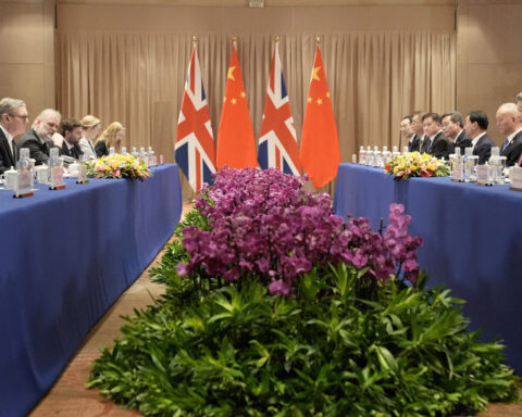 Britain pares back secretive China strategy review, seeking closer ties