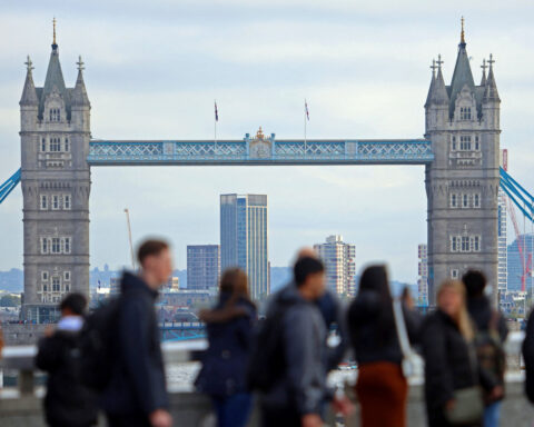 UK pay growth speeds up, adding to worries for Bank of England