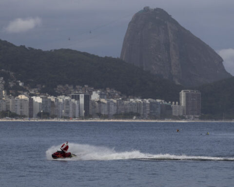 Brazilian Santa swaps sleigh for Jet Ski to deliver toys — and joy — to disabled children in Rio