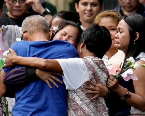 Filipina death-row prisoner in Indonesia arrives home in Philippines