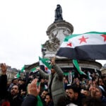 France to host Syria meeting, cautious on aid, sanctions lifting