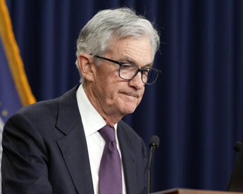 Federal Reserve cuts its key rate by a quarter-point but envisions fewer reductions next year