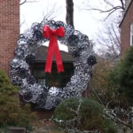 Baltimore man makes giant holiday wreaths out of hubcaps