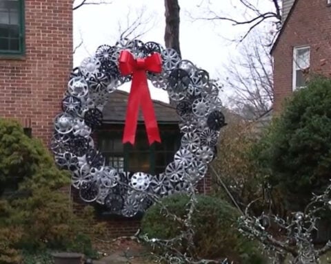 Baltimore man makes giant holiday wreaths out of hubcaps