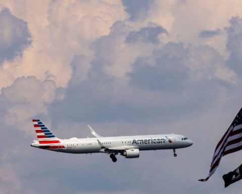 American Airlines settles race discrimination lawsuit by Black men removed from flight