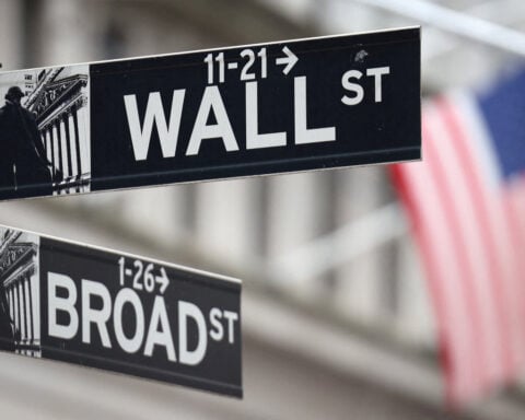 Wall Street ends mixed, Treasury yields rise as markets mull Fed's slowdown signal