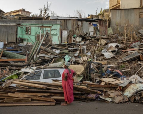 France's Macron says tour of cyclone-devastated Mayotte is a day he won't forget