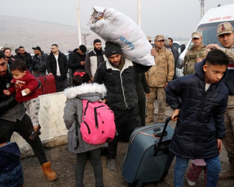 Large-scale refugee returns could overwhelm Syria, UN migration agency chief says