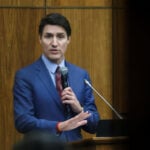 Key ally to Canada PM Trudeau says he will vote to bring him down